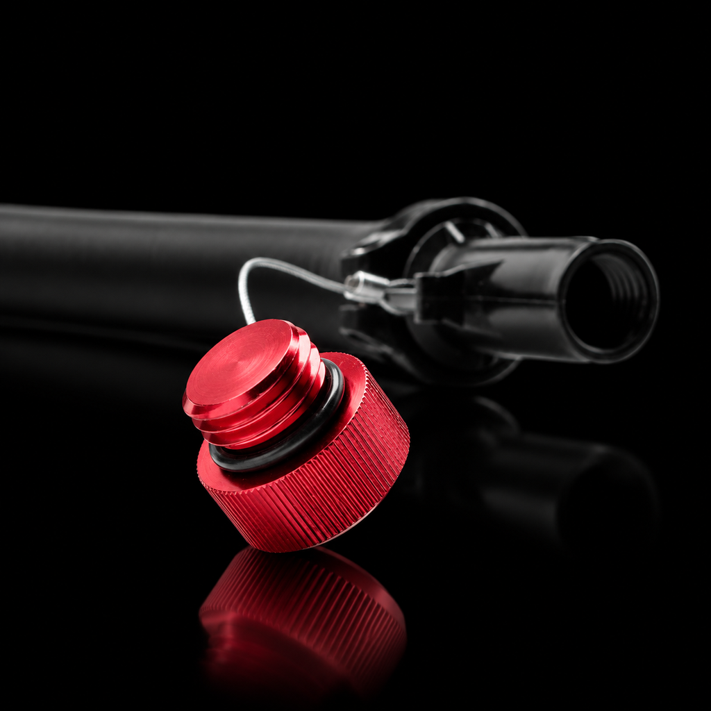 Hose Bender screw cap close-up on black