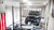 Garage Lighting & Tech collection poster featuring a garage with a Jeep in it and a home gym in the corner all very well lit up by an MPI full room lighting system