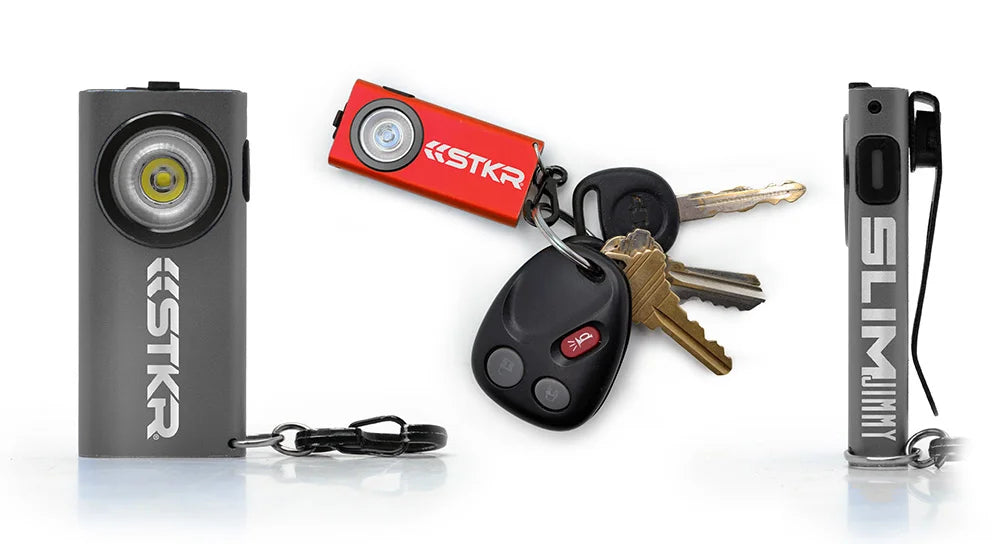 Keychain lights with 'STKR' branding on a white background